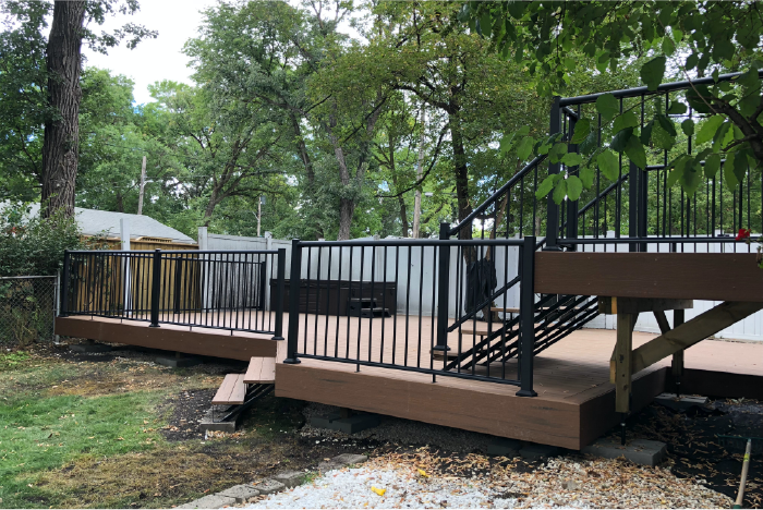 Brown composite deck with railing