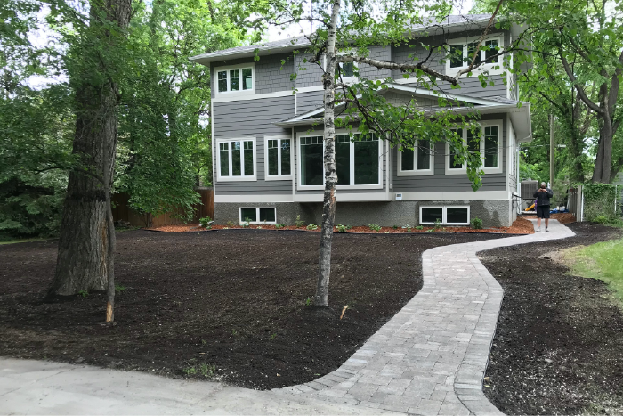 Yard graded with fresh top soil